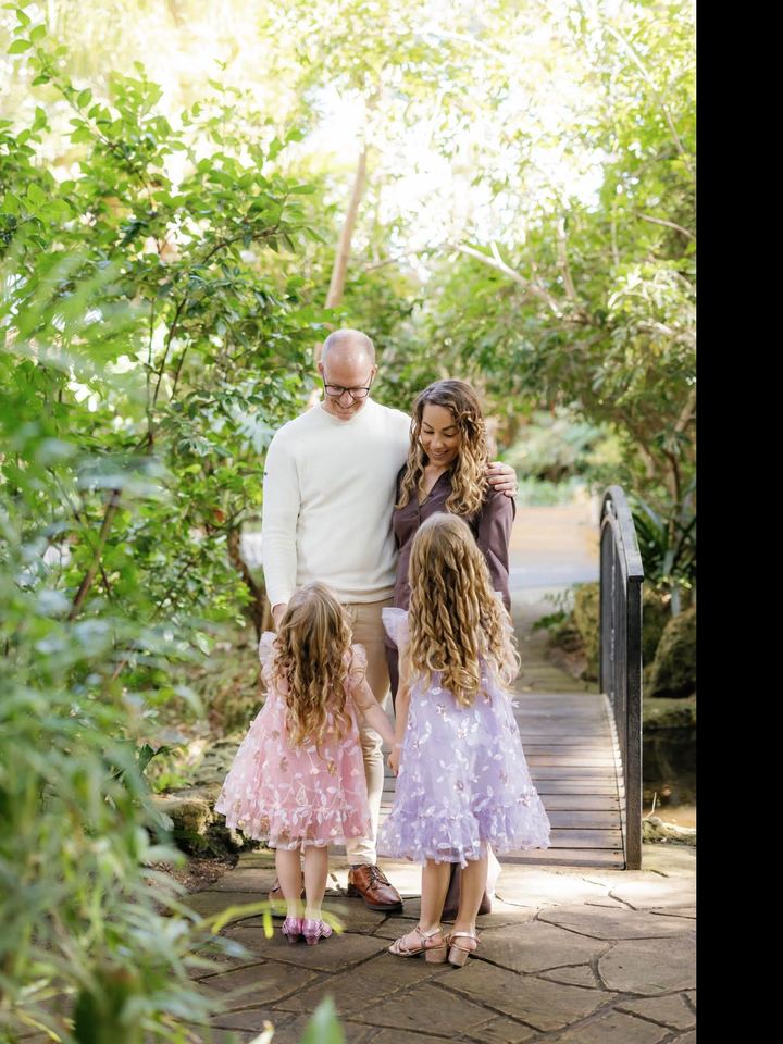 Christopher and Maria Barnes with their daughters